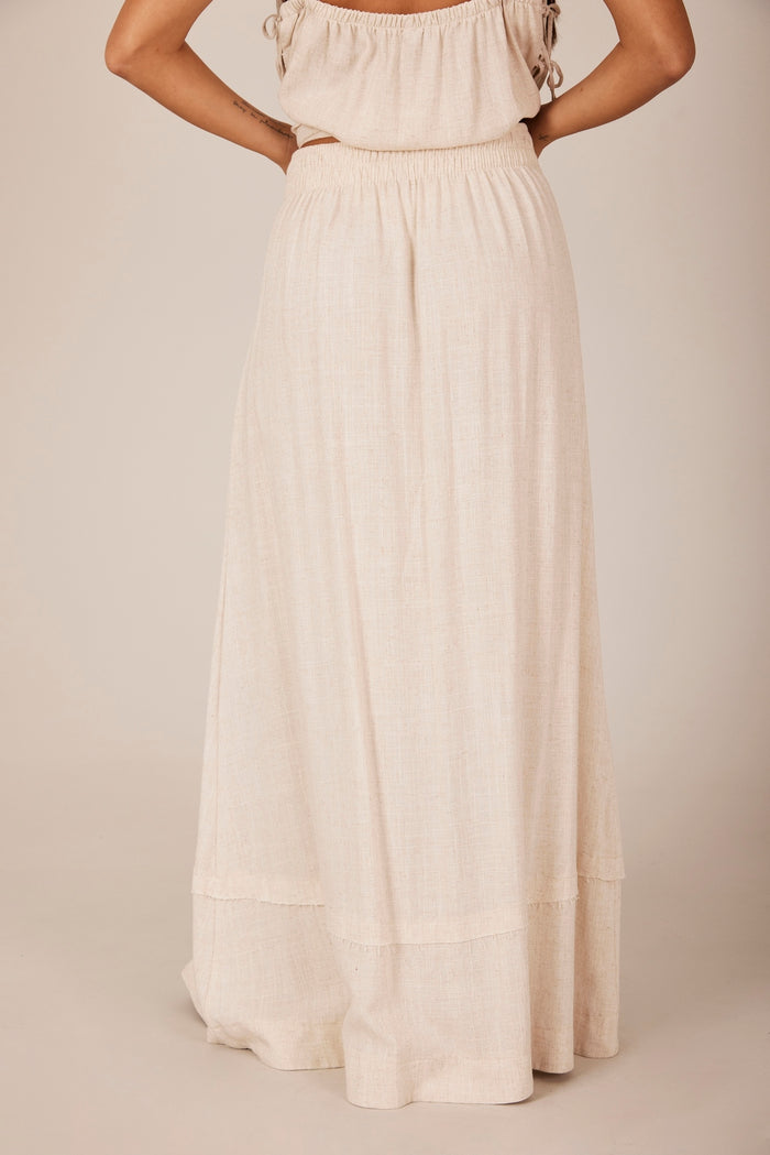 Saia Longa Linho Com Botões Bege Yacamim A19 Liso