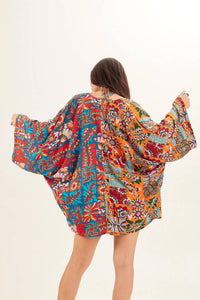 Kimono Curto Com Mangas Longas Estampado Yacamim<br />
<p>
</p>